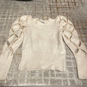 Puff sleeve sweater with gold bead embellishments